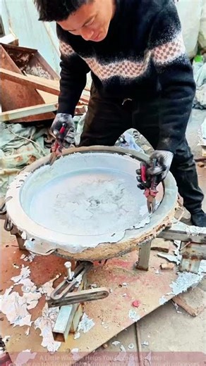 Workers Debugging a Large Rotating Device in the Workshop, On - site Work Footage
