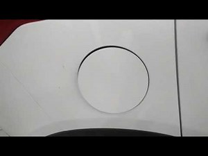 How do I unlock the fuel filler flap of the Opel Meriva B?