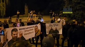 36K views · 1.3K reactions | Several men wearing MILITARY UNIFORMS show up at Kiev protest tonight They're holding banners calling Zelensky and his right-hand man Yermak "murderers of democracy" and "traitors to Ukraine" Another banner says they are 'destroying the country' | Forbidden News | Facebook