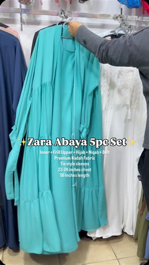 Your Dream Abaya Shop 🎀 on Instagram: "| Zara 𝐀𝐛𝐚𝐲𝐚-5pcs Set 1. Upper with tie style sleeves and Huge flare 2. Separate inner 3. Matching Belt 4. Hijab 5. Niqab Premium Soft Nadah Fabric 56 inches maximum length 23 inches chest . 𝟐 𝟎 𝟐 𝟓 | 𝟏 𝟒 𝟒 𝟔 ✨ . . Order method: Take screenshot Inbox your name, address and active number Type “Done” ✅ Wait for our response on instagram . . . . . . . . . . #muslim #abayafashion #hijabtutorial #abayadubai #modest khimar islamicquotes jilbab hijab