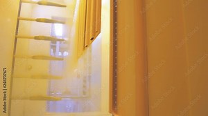 The operation of the powder coating chamber in an electrostatic field