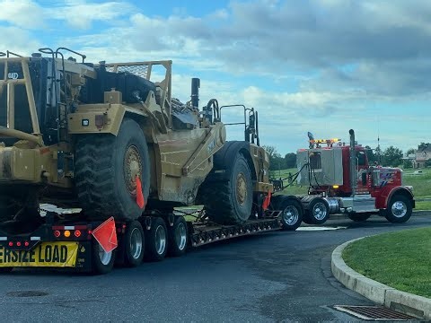 Loading and Hauling Cat 627K Tractor-Scrapers - Rob's Towing