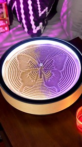 Watch delicate butterfly wings unfold through cascading glitter sand, each wing beat captured in shimmering detail. Nature’s most elegant transformation brought to life in sparkling artistry - where dreams take flight and magic settles into place. Get Oasis Mini now. | Grounded Labs