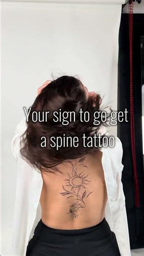 This is your sign to get a spine tattooo