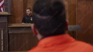 Police testifying against suspect in court room