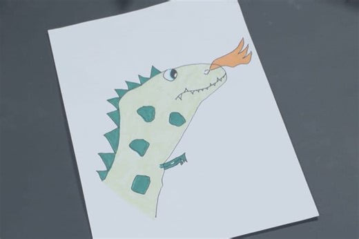 Comment placer sa main pour dessiner ce beau dragon cracheur de feu ?