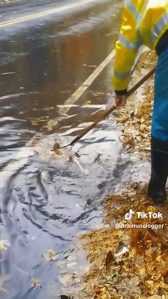 Post 10 draining a massive street flood using a rake! #fyp #drain #draingang #draincleaning #uncloggingdrains #uncloggingadrain #satisfyingvideo #relaxing #satisfying #relaxingvideos #cleaning
