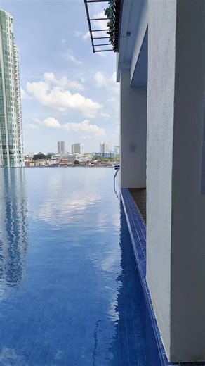 rooftop swimming pool at level 12 Space Residency suite...