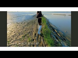 Chinese beautiful woman Lily in white high heel over knee boots get stuck in the mud and struggle