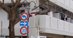 Japanese road signs in Tsuboya district is assocated with traditional ceramics like shiisa. Okinawa, Japan. 20-1-20
