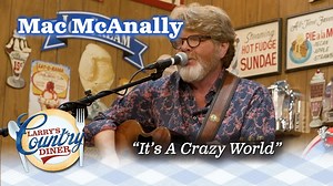 6.3K views · 309 reactions | Mac McAnally sings "It's A Crazy World" on Larry's Country Diner from season 20. Filmed in 2020 | Larry's Country Diner | Facebook