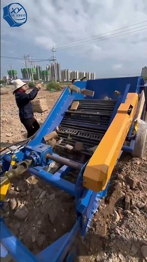 Rock Picker at Work | Tractor Collecting Stones in the Field #farming #grainstiffenerproductionline