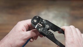 Crimping Connector on Internet Cable, Hand of Craftsman with Tool, Close-up Stock Video - Video of modem, ethernet: 305058851