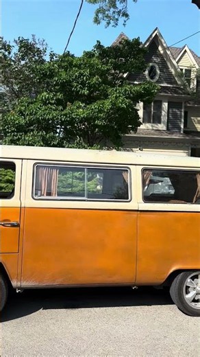 70’s classic Volkswagen Type 2 Transporter bus, often referred to as a "Bay Window" model.