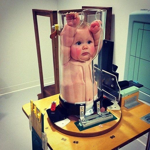 This Baby Is Being Squeezed Into a Glass Tube for a Good Reason