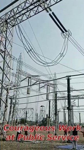 400,000 Volts Live Power Lines. Work on Extremely High Voltage. Hotline/Bare-Hand/Hot-Hand Method.