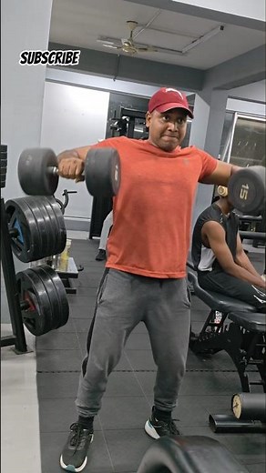 Building boulder shoulders with side dumbbell raises 💪🔥 #ShoulderDay #FitnessMotivation