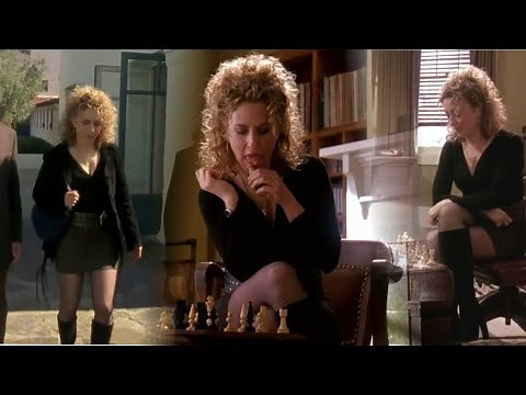 Bitty Schram wearing a miniskirt with black pantyhose and boots from the RV series Monk - s02e01