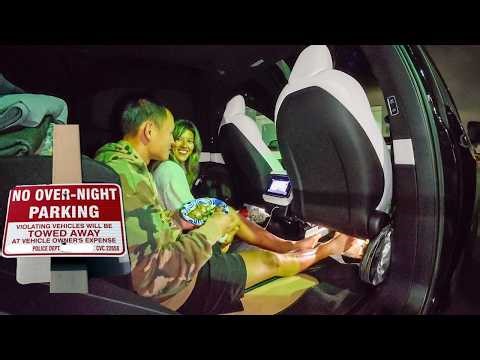 Stealth Camping in a Tesla Under a “no overnight parking” Sign
