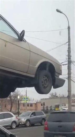 Glitch in Reality? This Car Is Suspended!