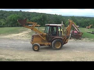 Case 580K 4x4 backhoe tractor with loader