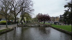 Low Drone River Windrush bridge Bourton on the Water Cotswold village UK