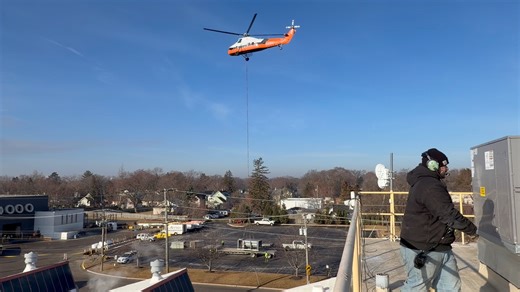 Up up and away! Fun Friday at ATMI removing the old rtus and installing the new with help from Midwest Helicopter Airways, Inc. | Airtech