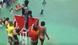 Prisoners Took Advantage Of Local Flash Floods, Made Their Own Swimming Pool In The Court Yard!