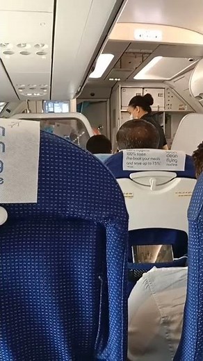 Air hostess announcement to get a (air) sick bag (Vomit bag)
