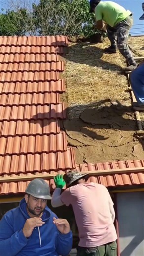 Roof with thatch and cement mortar covering.
