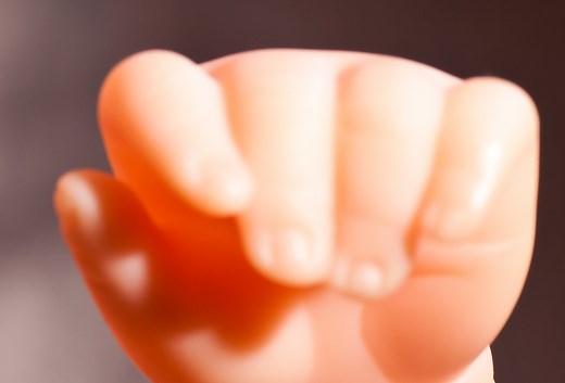 "Machine with Abandoned Doll" is a captivating artwork by Arthur Ganson