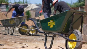 1.5K views · 33 reactions | It's not just a wheelbarrow - it's a tool for building a future. Each load it holds helps create something bigger; a classroom that shelters 10 kids, a foundation that builds a foundation for tomorrow. Every mix and every brick is made possible by 25 Metal Masters hands at our factory. Watch our latest Day In The Life episode to see how it all comes together with #LasherTools. | Lasher Tools | Facebook