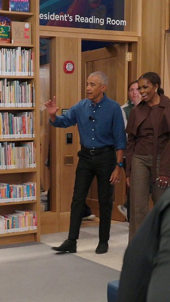 This is genuinely heartwarming to watch. Seeing President Obama and Michelle Obama sitting together on the floor of the new Chicago Public Library branch, fully present and reading Where the Wild Things Are to those bright, engaged kids, is such a beautiful reminder of what really matters. The way the children lit up, made their claws, and roared along with the story shows exactly why moments like this are so powerful.Libraries aren’t just buildings full of books—they’re places where curiosity i