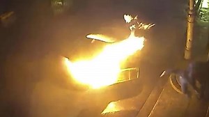 Video captures two Melbourne thieves set a stolen car alight and narrowly avoid the explosion