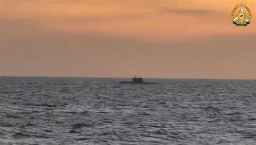 The Russian submarine UFA 490 is being monitored and escorted by a Philippine Navy aircraft during the former's transit in the West Philippine Sea on November 28. | Armed Forces of the Philippines