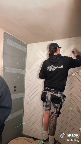 Stunning Double Herringbone Tile Wall Design