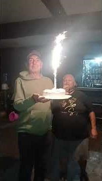 Here we are at the high school delivering a delicious cake