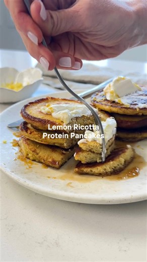 These lemon ricotta protein pancakes are a sweet and delicious way to incorporate a bit more protein into your breakfast routine! 🍋 Recipe at: https://downshiftology.com/recipes/lemon-ricotta-protein-pancakes/ | Downshiftology