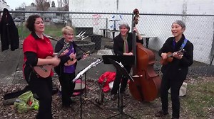 Here is Eugene's most original Ukulele band: The Refreshments, performing the classic pop hit: Going to the Chapel of Love during tonight's Springfield 2nd Friday Artwalk. The band members are Patty Sage, Yayoe Kuramitsu, Denise Hinz, and Leslie Hunter. | SeenEugene