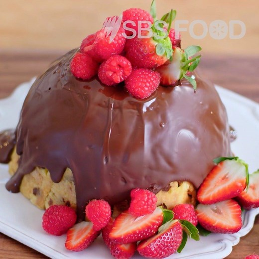 This show-stopping dessert by Silvia Colloca is called a zuccotto, made by stuffing a panettone with sweet chocolate and vanilla ricotta-cream filling. bit.ly/ricottazuccotto | SBS Food