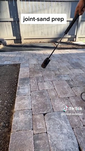 Before we install polymeric sand we need to clean out the joints of any kind of debris that found its way in there during construction, as well as ensure there is no moisture present. ##polymericsand##paverpatio##hardscape##landscaping