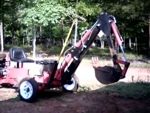 Harbor Freight towable trencher/backhoe one year review.