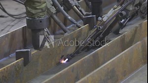 Steel Box Beam Welding Line. Submerged Arc Welding, SAW Process. Automatic Submerged Arc Welding Saw Machine. Close-up. Plants and industry concept. Industrial manufacturing. Shipbuilding factory.