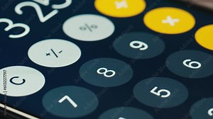 Man counts numbers on a calculator phone screen , smartphone, cell phone. Arithmetic, accounting, payroll, money. Add, subtract, multiply, divide. High quality studio shot close up, macro.