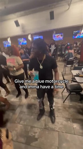 Experience the Thrill of Line Dancing on a Blue Motorcycle