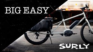 Introducing Big Easy, our Long Tail Electric Cargo Bike. Designed to expand what’s possible by bike. Simply put, haul more with less effort. Hell, leave the car at home once in a while. For all the steely details, check out Big Easy bike page here: https://surlybikes.com/bikes/big_easy To hear about why we did it, check out our blog post here: https://surlybikes.com/blog/big_easy_introduction_spewage | The Official Intergalactic Surly Regional HQ
