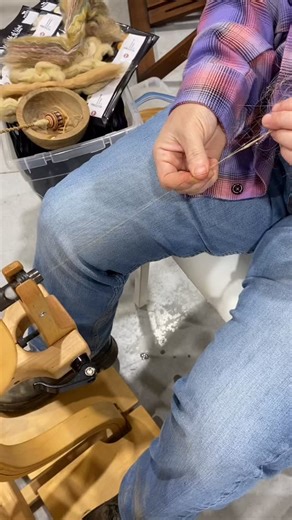 Mandy spins flax from the strick in our Flax, Silk, Cotton class. #boss #makingyarnbyhand #fairytalefibers #tabbytreefiberarts #flaxintolinen #strawintogold | Fairy Tale Fibers