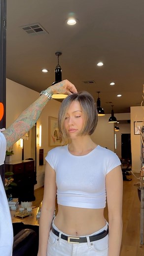 •the consultation• My client @anessa.hernandezz has a ton of hair. She was trying to grow it but got over it so we chopped it off to her chin. One of my favorite haircuts we’ve done on her. We cut a lot into it layered it a little. I left her right side a lil longer to give it an edge. Don’t be afraid to change your clients looks. It’s what makes you stand out. Love y’all DomDom | Dom Dom Hair