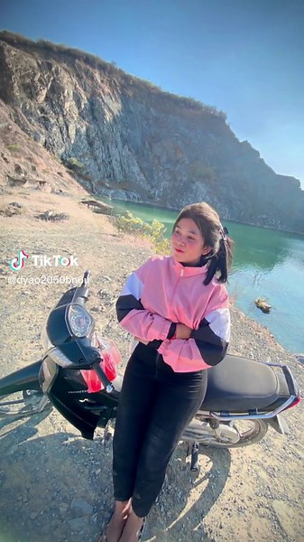 Emotional Motorcycle Pose by the Water