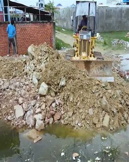25K views · 295 reactions | A good project to fill in flooded areas with rocks using a Bulldozer D20 P push the rocks into #trucks #backfill #komatsu #caterpillar #machine #construction #heavyequipment #engineering | Branzo Construction | Facebook